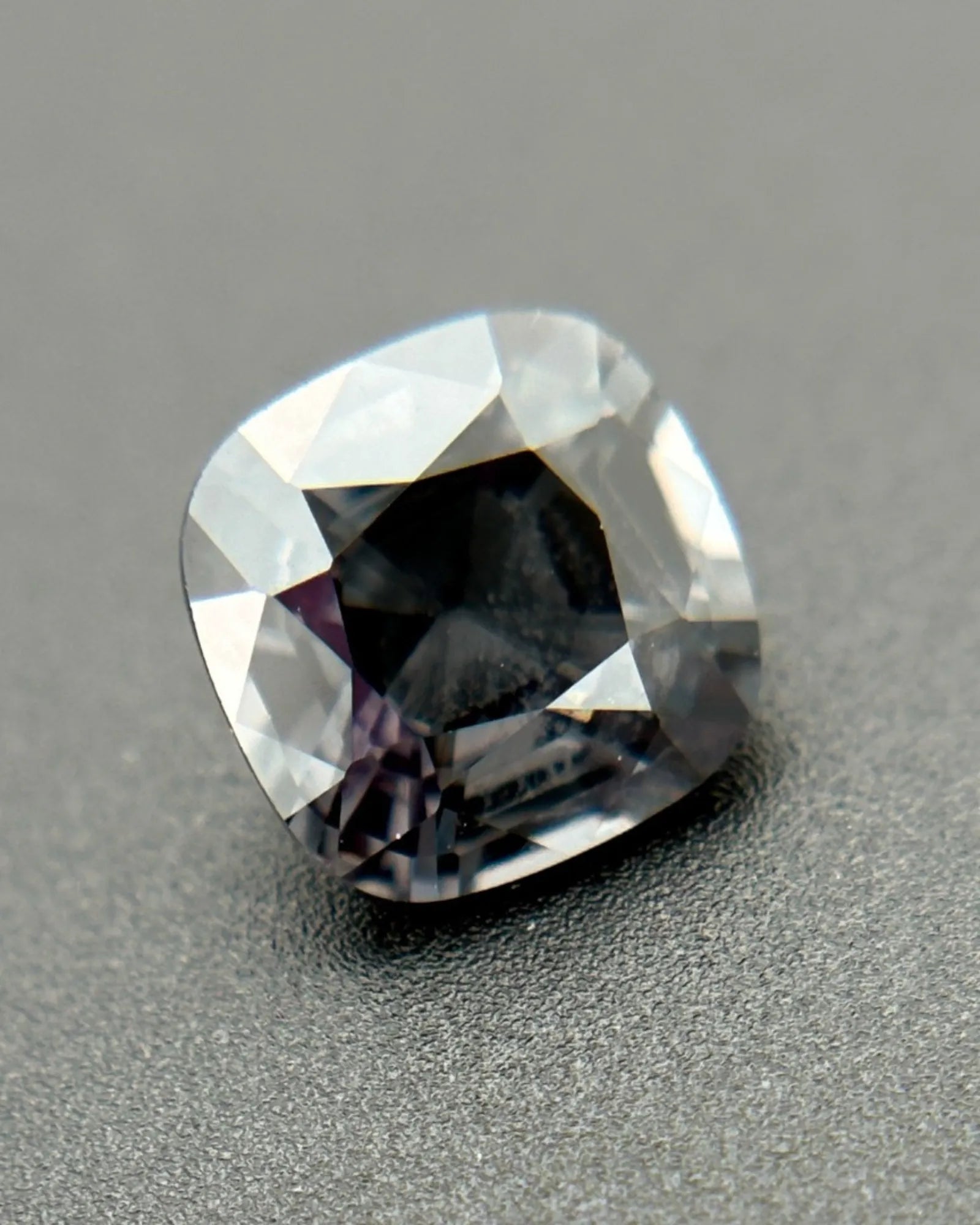 Side profile of 2.2ct Natural Gray Spinel cushion gemstone | SARATTI