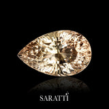 Side profile of 8.62 carat Imperial Topaz pear gemstone | SARATTI