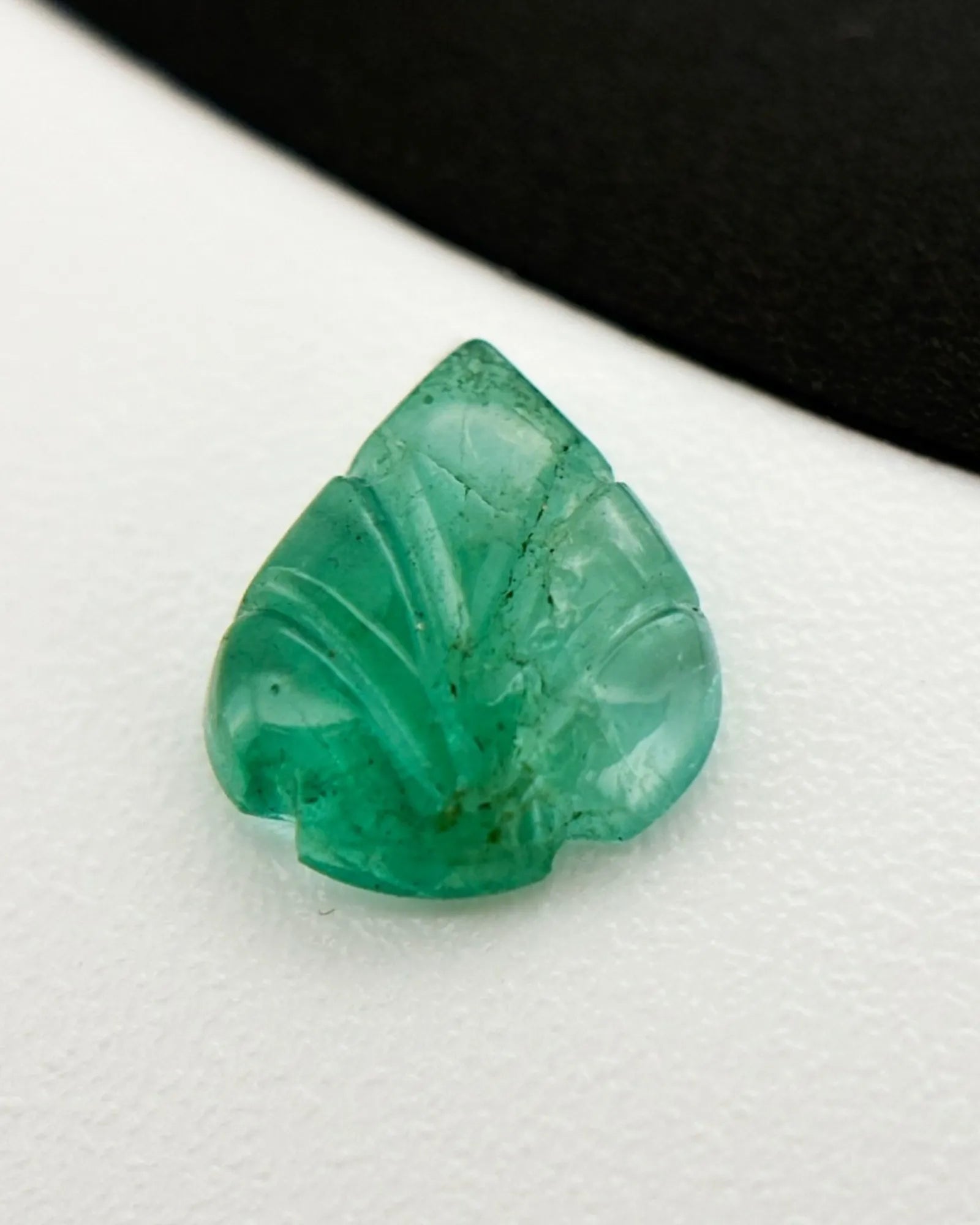 Side profile of Natural Emerald leaf showing raised relief depth | SARATTI
