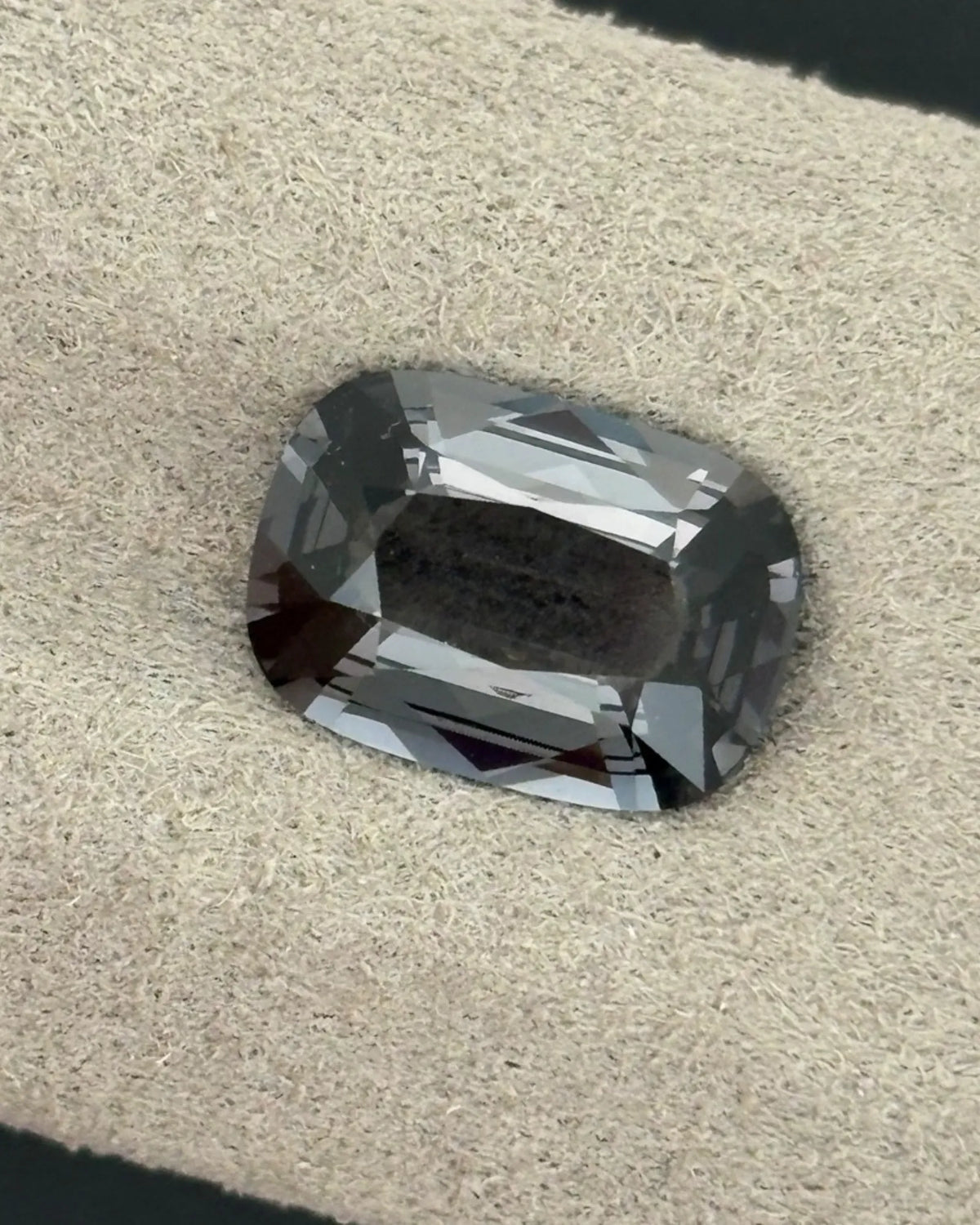 Side profile of Natural Gray Spinel elongated cushion stone | SARATTI