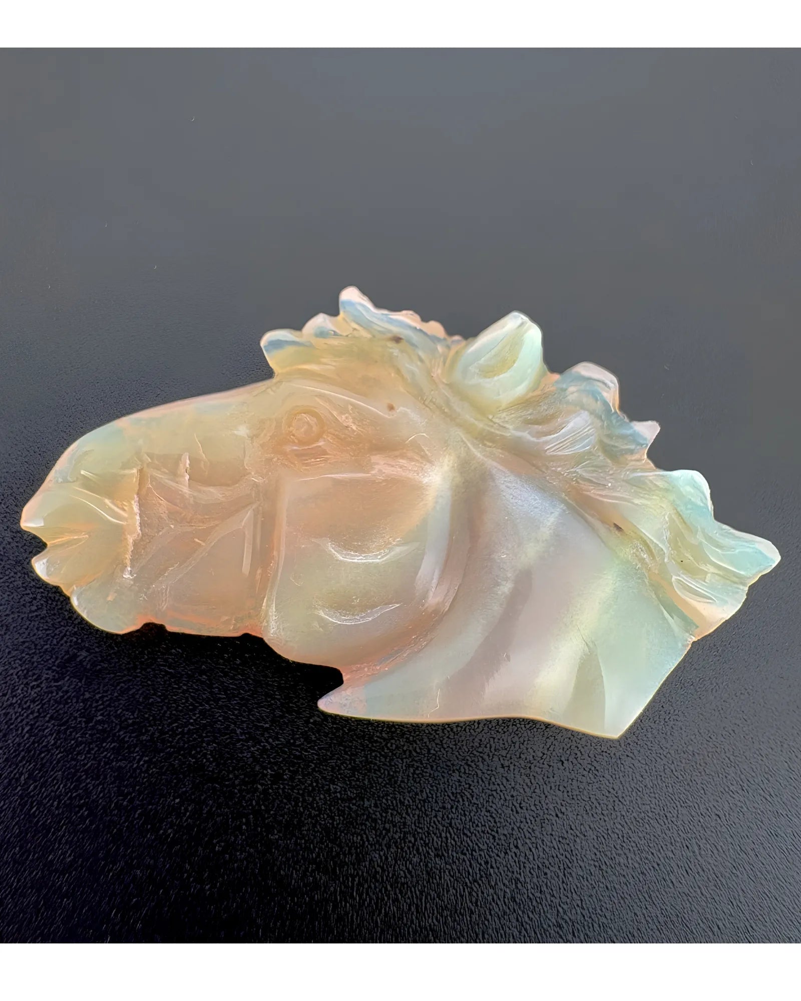 Side profile of Natural White Opal three-dimensional horse head | SARATTI