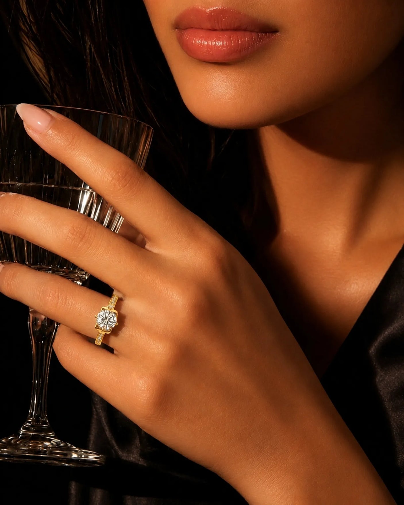 Side profile of round moissanite ring with pavé stones and sculpted fleur-de-lis gallery in 18K yellow gold | SARATTI