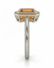 Side view emerald cut Imperial Topaz halo setting in platinum | SARATTI