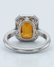 Side view emerald cut Imperial Topaz halo setting in white gold | SARATTI
