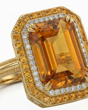 Side view emerald cut Imperial Topaz halo setting yellow gold -- SARATTI