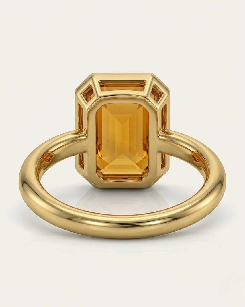 Side view emerald cut Imperial Topaz halo setting yellow gold | SARATTI