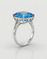 Starburst-cut topaz statement ring with open gallery and pavé diamond shoulders in platinum | SARATTI