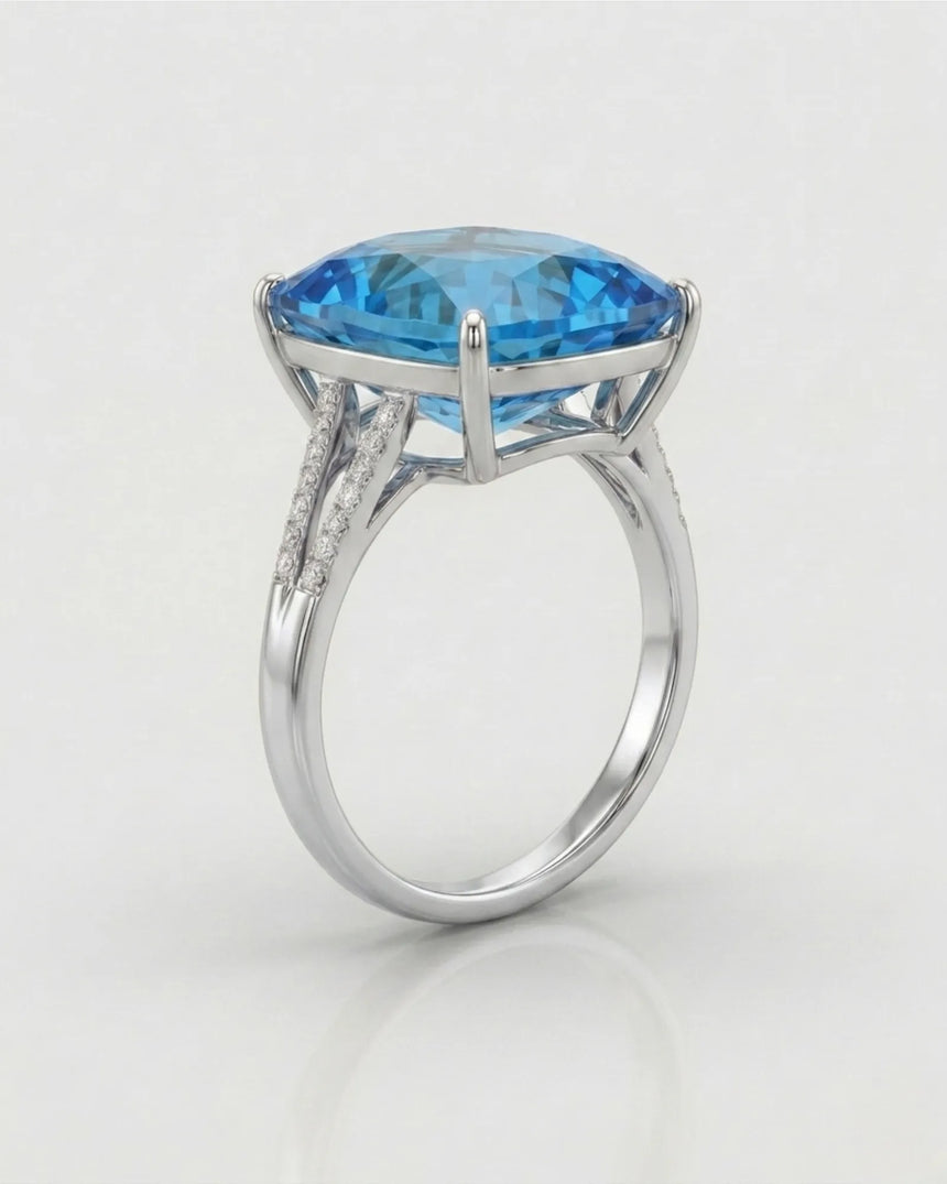 Starburst-cut topaz statement ring with open gallery and pavé diamond shoulders in platinum | SARATTI