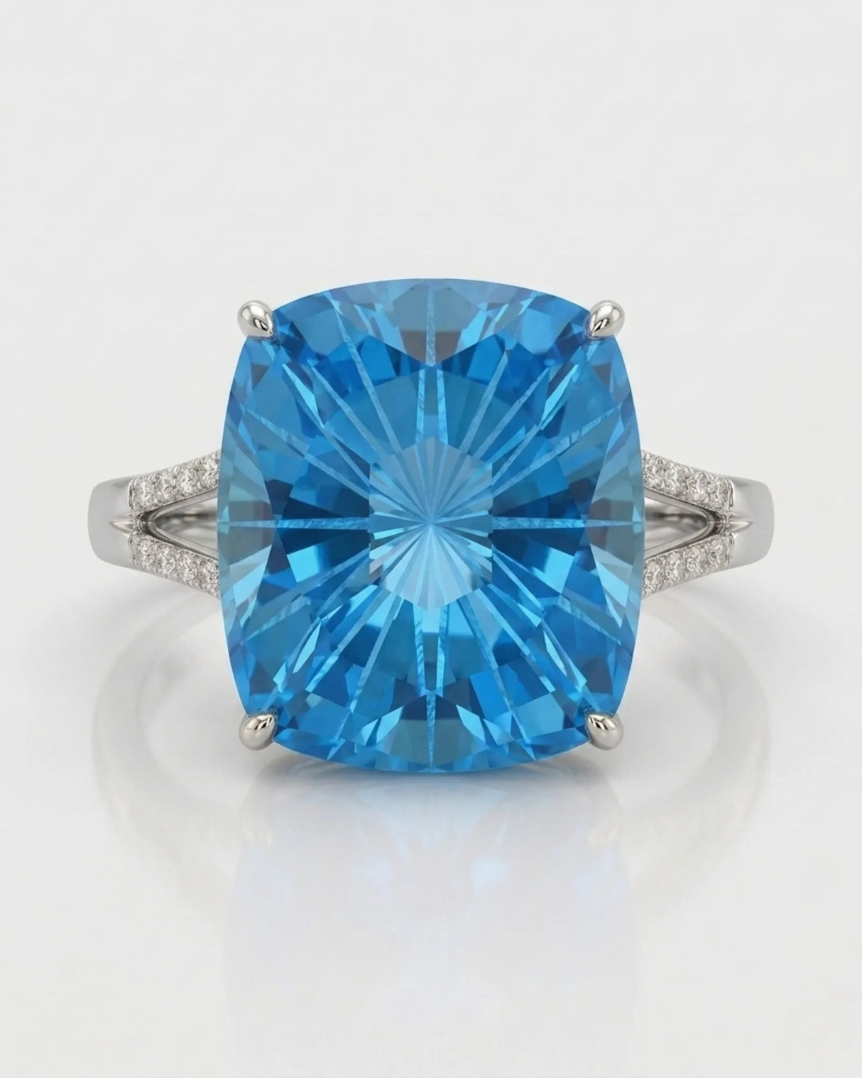 Starburst-cut topaz statement ring with open gallery and pavé shoulders in 18K white gold | SARATTI