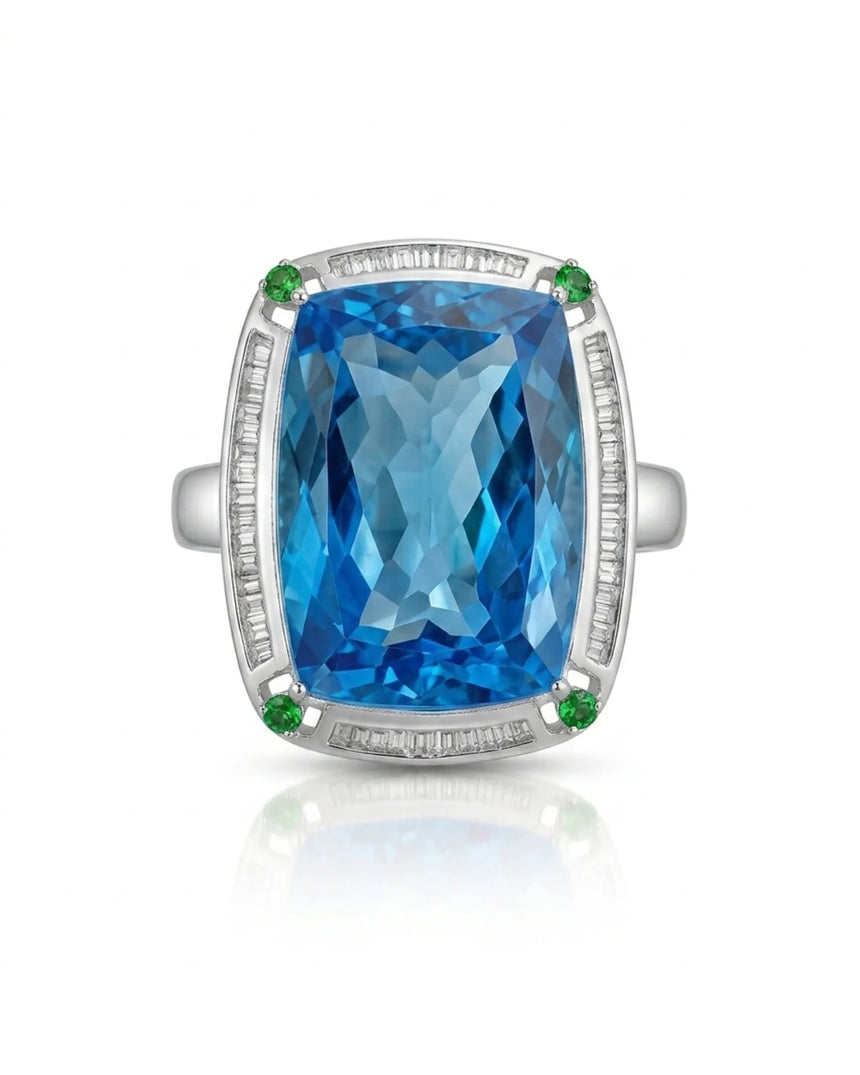 Statement blue topaz cocktail ring with green accents for milestone celebrations in platinum | SARATTI
