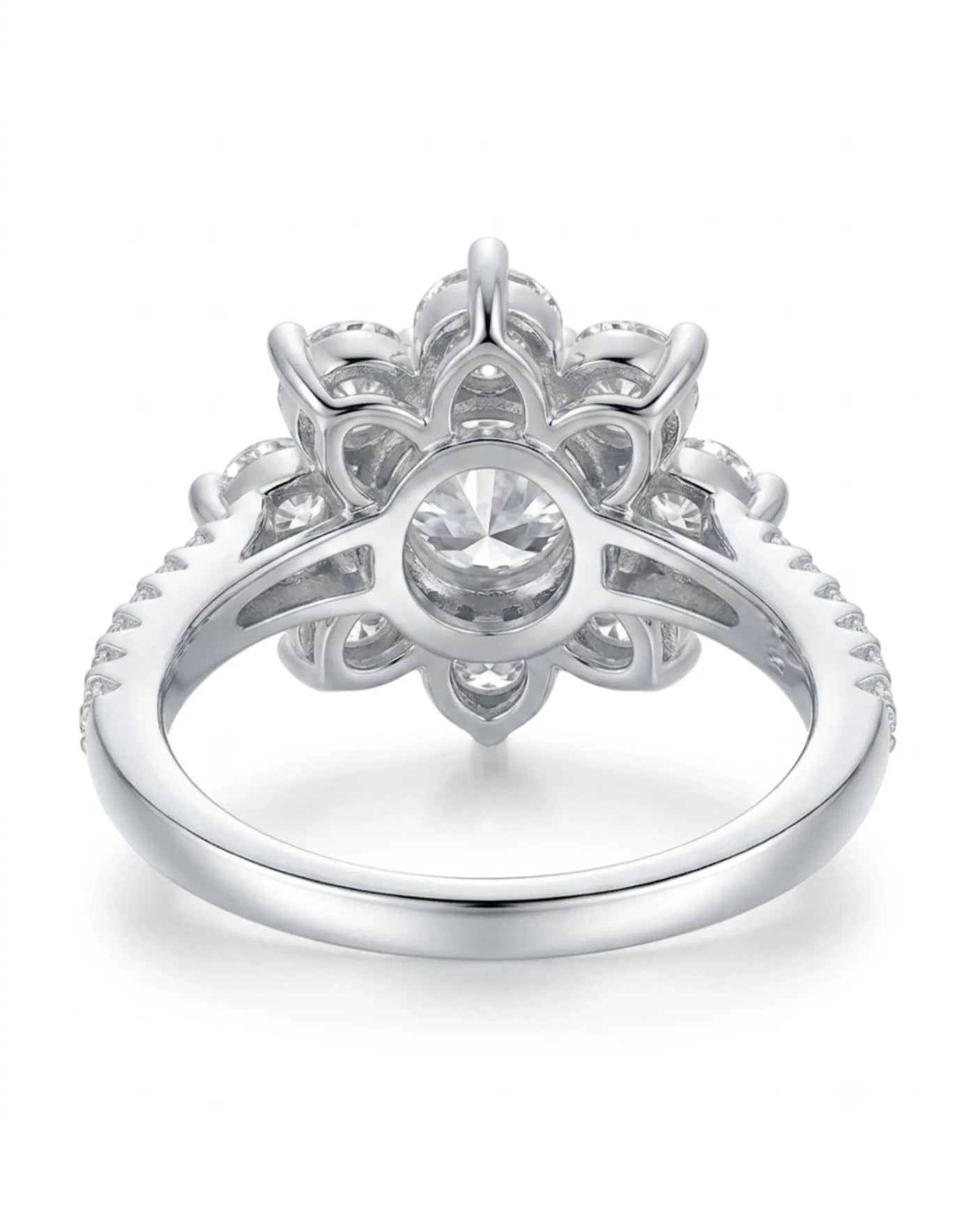 Statement floral moissanite engagement ring with pavé shoulders crafted in polished platinum | SARATTI