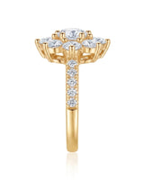 Statement floral moissanite engagement ring with pavé shoulders crafted in warm 18K yellow gold | SARATTI