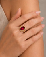 Sunburst halo tourmaline ring with round diamonds and polished 18K yellow gold setting | SARATTI