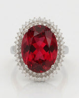 Sunburst halo tourmaline ring with round diamonds and refined platinum setting | SARATTI