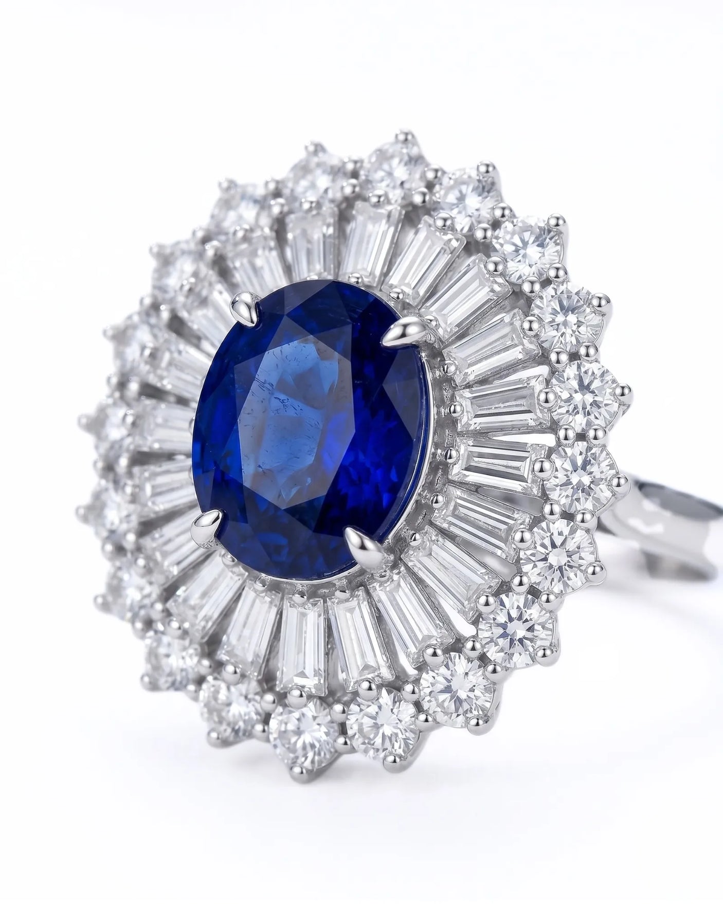 Sunburst sapphire ring with tapered baguette and round diamonds in refined platinum | SARATTI