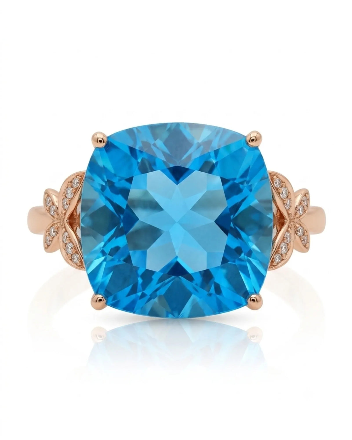 Swiss Blue cushion topaz ring with vivid color and round diamonds in 18K rose gold | SARATTI
