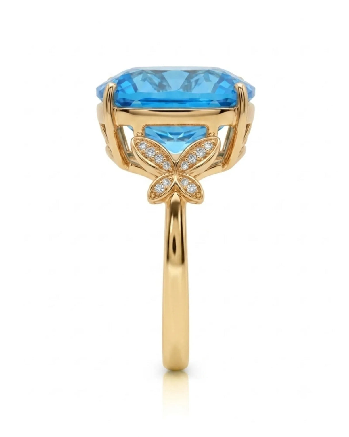 Swiss Blue cushion topaz ring with vivid color and round diamonds in 18K yellow gold | SARATTI