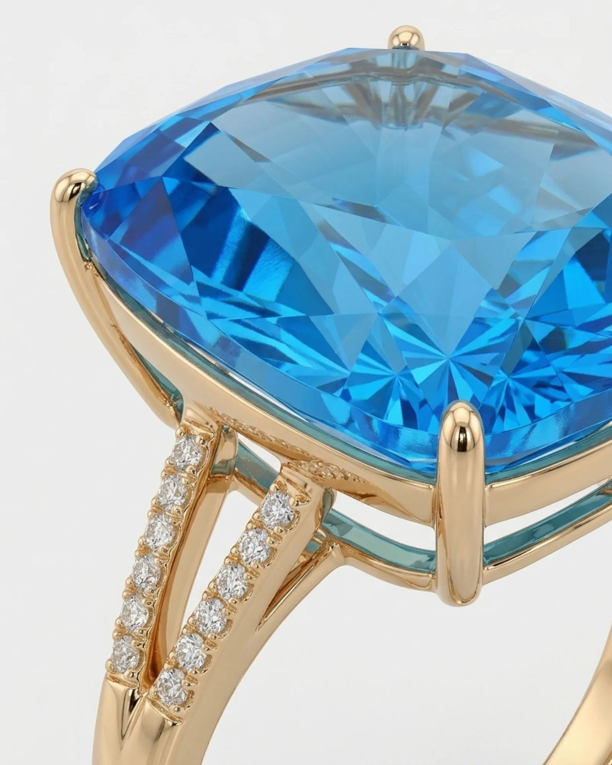 Swiss Blue topaz and diamond engagement ring with sculpted split shank in 18K yellow gold | SARATTI