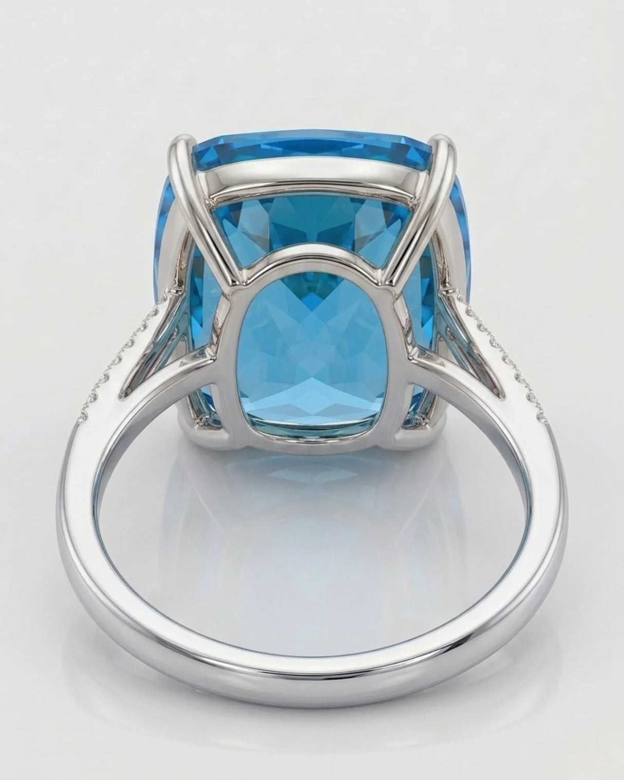 Swiss Blue topaz and diamond engagement ring with sculpted split shank in platinum | SARATTI