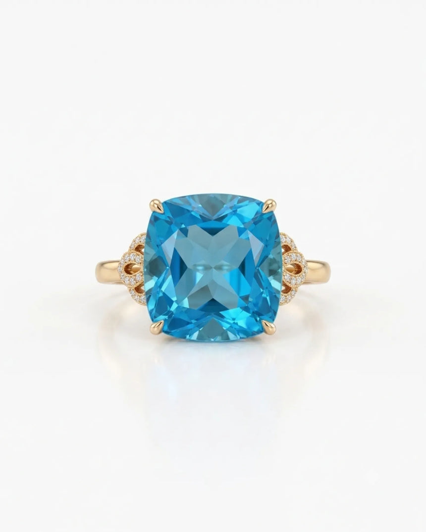 Swiss Blue topaz engagement ring with romantic diamond scrollwork in 18K yellow gold | SARATTI