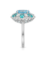 Swiss Blue topaz engagement ring with romantic floral halo in 18K white gold | SARATTI