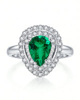 Teardrop emerald ring with diamonds in 18K white gold | SARATTI
