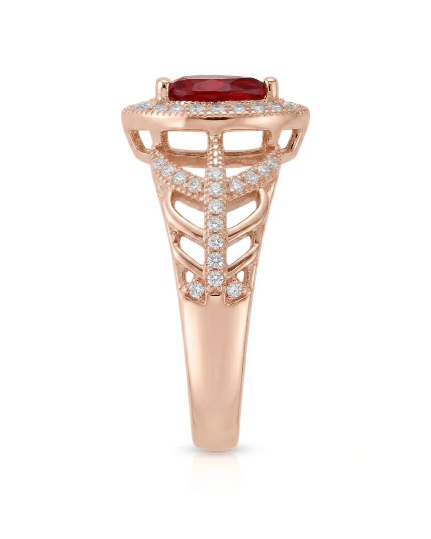 Teardrop ruby ring with pavé diamond openwork design in 18K rose gold | SARATTI
