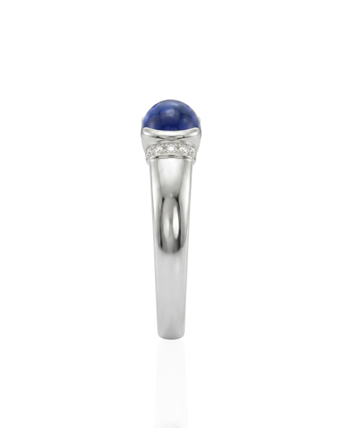 Tension set sapphire ring with modern ribbed band design in 18K white gold | SARATTI