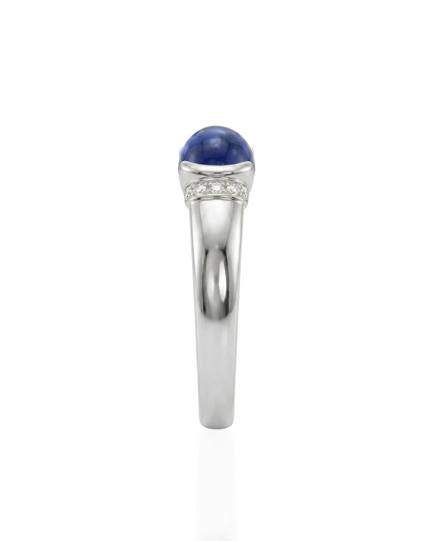 Tension set sapphire ring with modern ribbed band design in 18K white gold | SARATTI