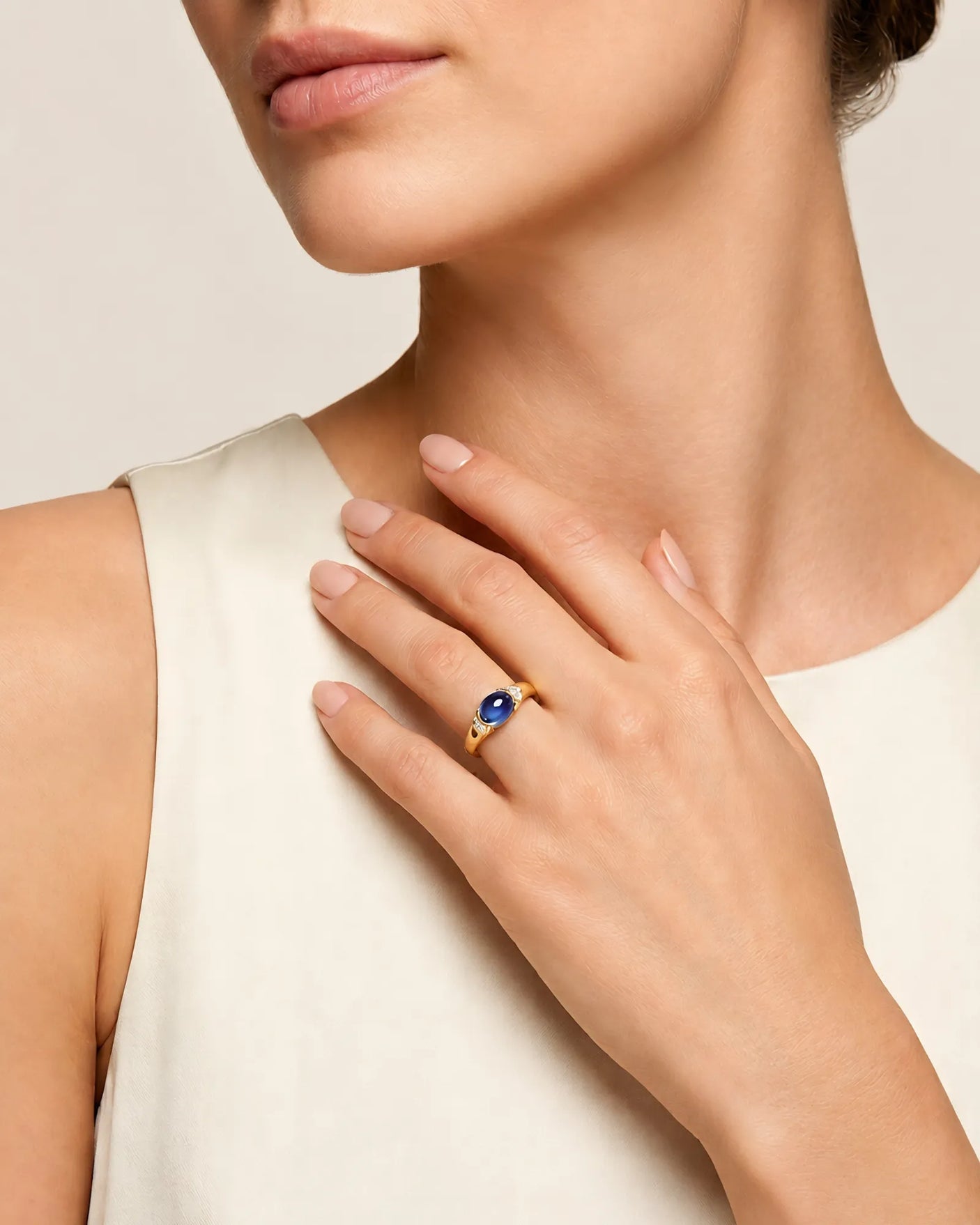 Tension set sapphire ring with modern ribbed band design in 18K yellow gold | SARATTI