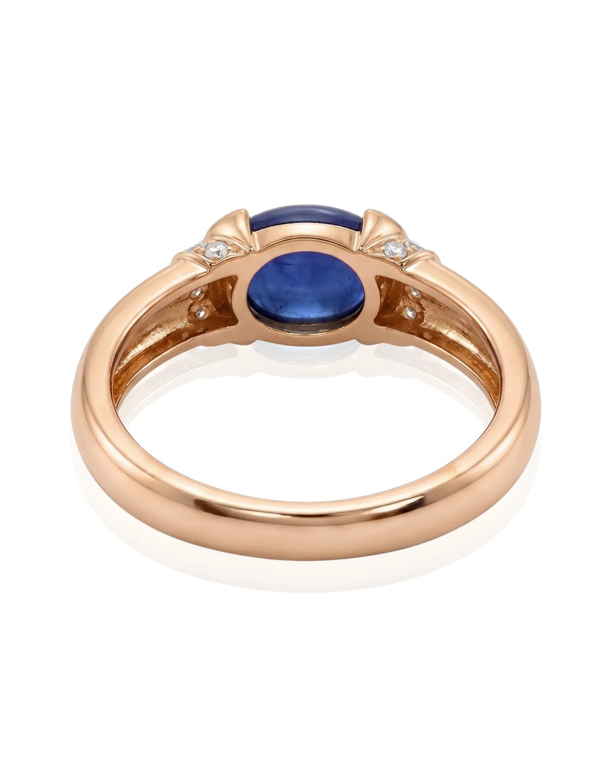 Tension set sapphire ring with soft modern band design in 18K rose gold | SARATTI