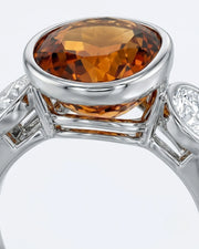 Three-stone composition gives the design symmetry and presence in platinum | SARATTI