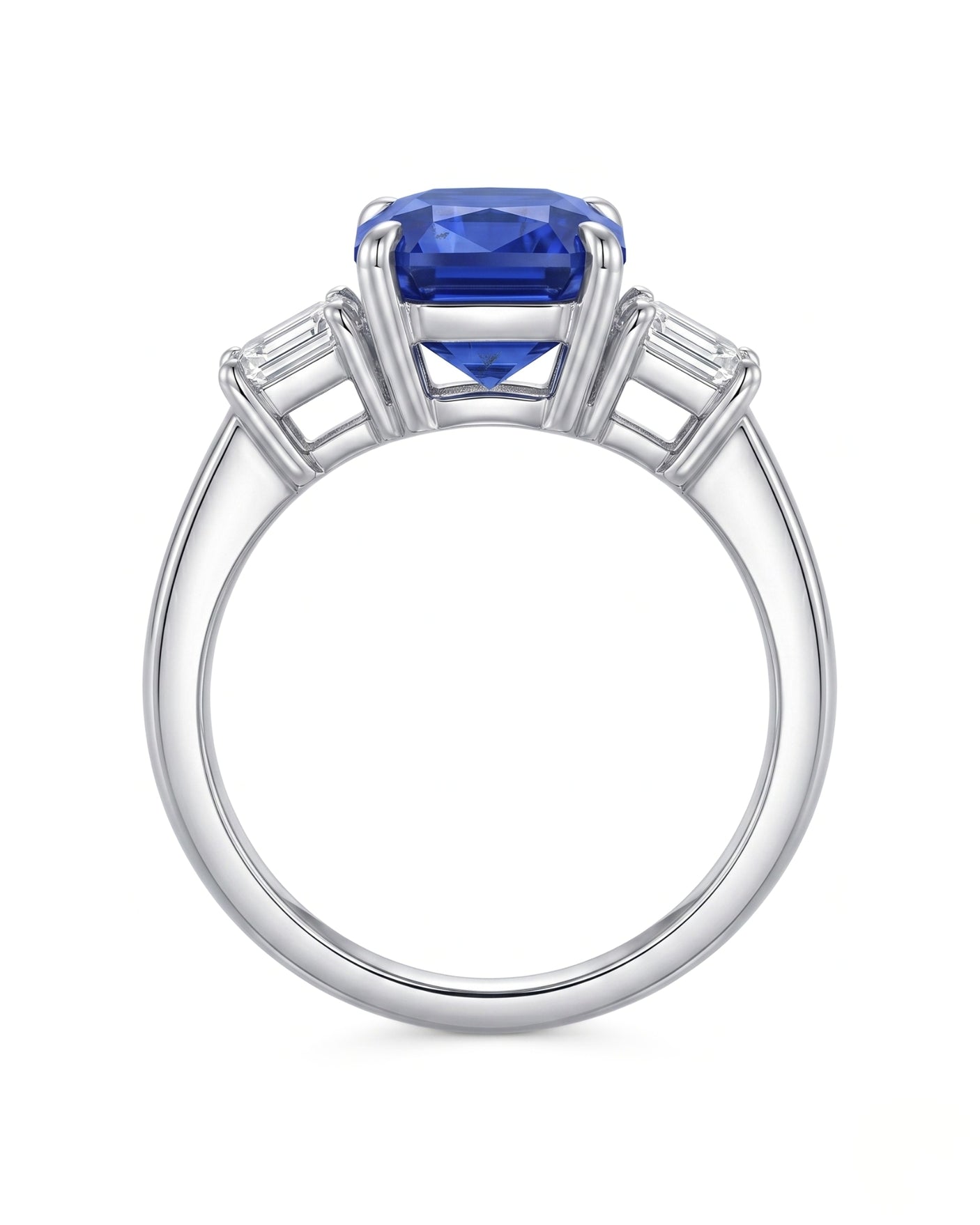 Three-stone sapphire ring with step-cut diamonds and architectural platinum setting | SARATTI