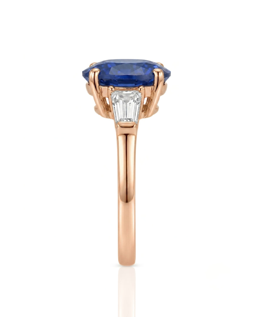 Three-stone sapphire ring with tapered baguette diamonds and refined 18K rose gold setting | SARATTI
