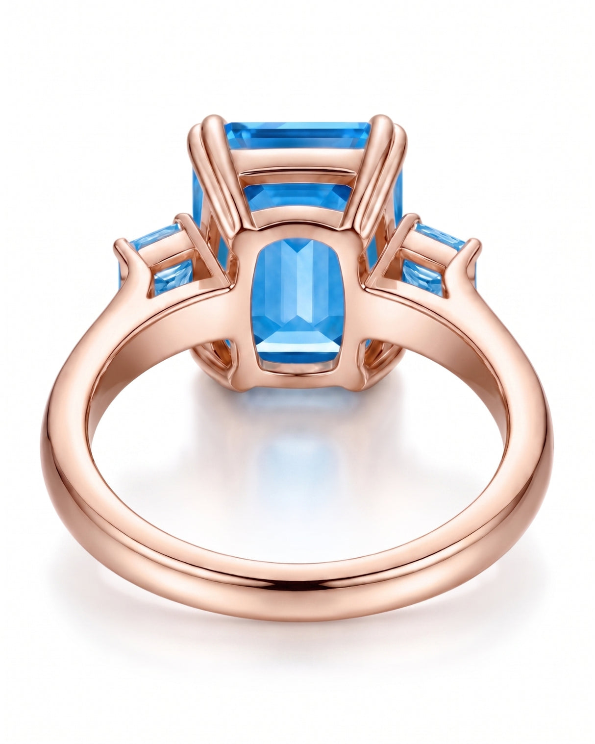 Trilune emerald-cut Aquamarine diamond three-stone ring setting in rose gold, profile view | SARATTI
