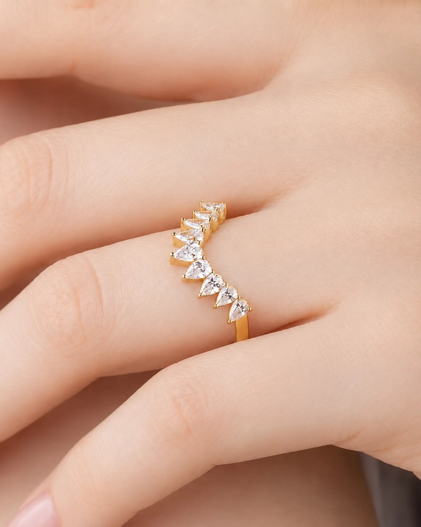 Tiara-inspired curved wedding band with pear-shaped diamonds in polished 18K yellow gold, half-eternity design | SARATTI