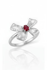 Top view pigeon blood red natural ruby ring with diamond accents white gold setting | SARATTI
