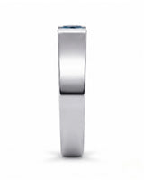 Treated blue diamond men’s wedding band worn on hand in polished 18K white gold | SARATTI