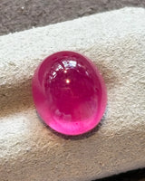 Treated glass-filled Natural Ruby oval cabochon detail | SARATTI
