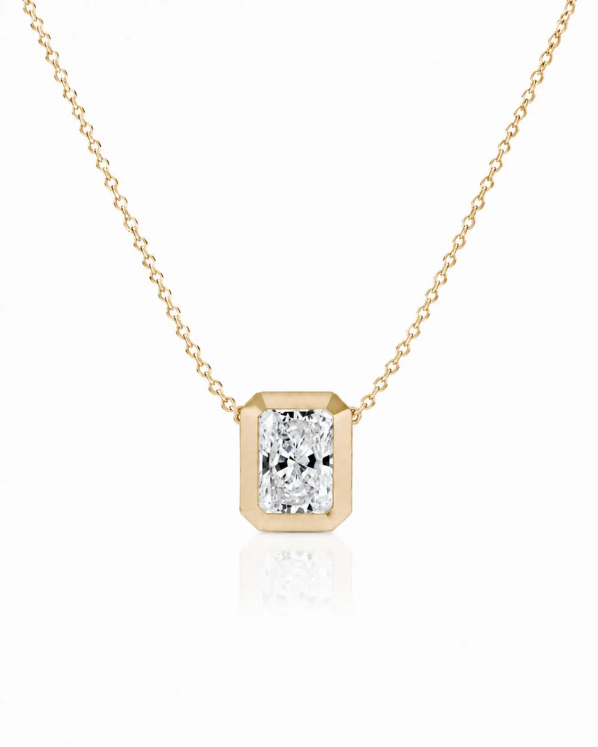 SOLARA Bezel-Set Radiant Cut solitaire necklace setting in yellow gold, front view | SARATTI