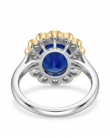 Two-tone floral sapphire ring with scalloped diamond halo -- SARATTI