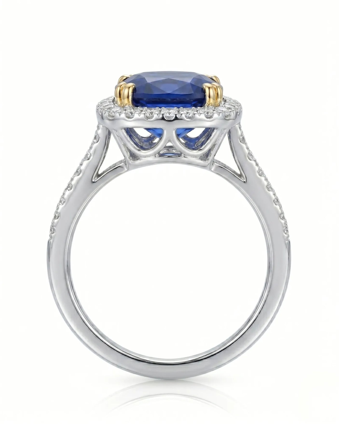 Two-tone sapphire ring with yellow gold prongs and diamond halo - SARATTI.