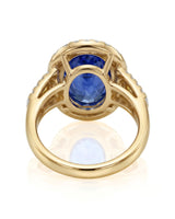Unheated oval blue sapphire ring with colorless diamonds and yellow diamonds in 18K yellow gold - SARATTI