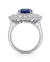 Unheated oval sapphire ring framed by radiant diamond rays in 18K white gold | SARATTI