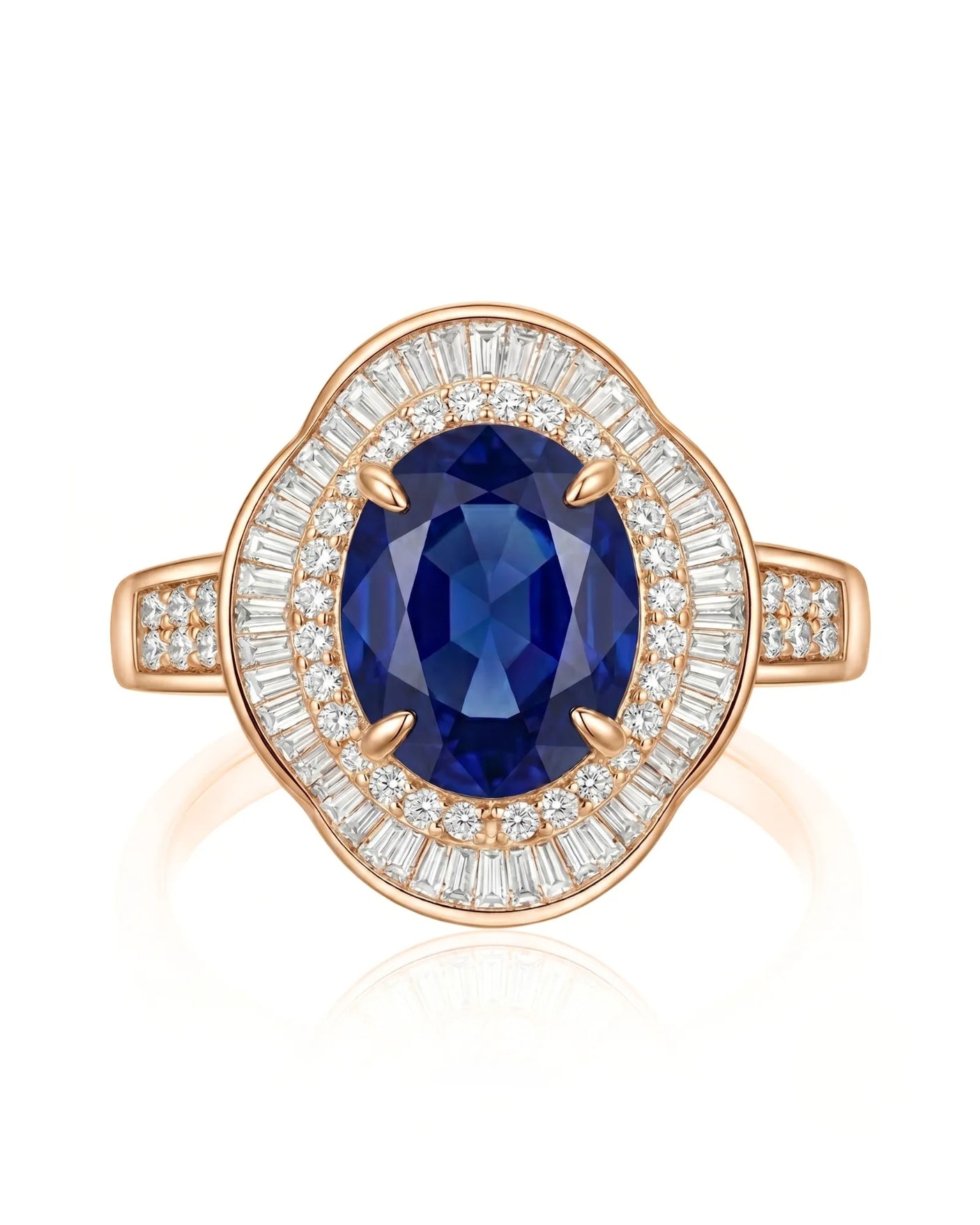 Unheated oval sapphire ring with tapered baguette diamonds and royal blue center in 18K rose gold | SARATTI
