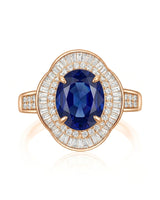 Unheated oval sapphire ring with tapered baguette diamonds and royal blue center in 18K rose gold | SARATTI