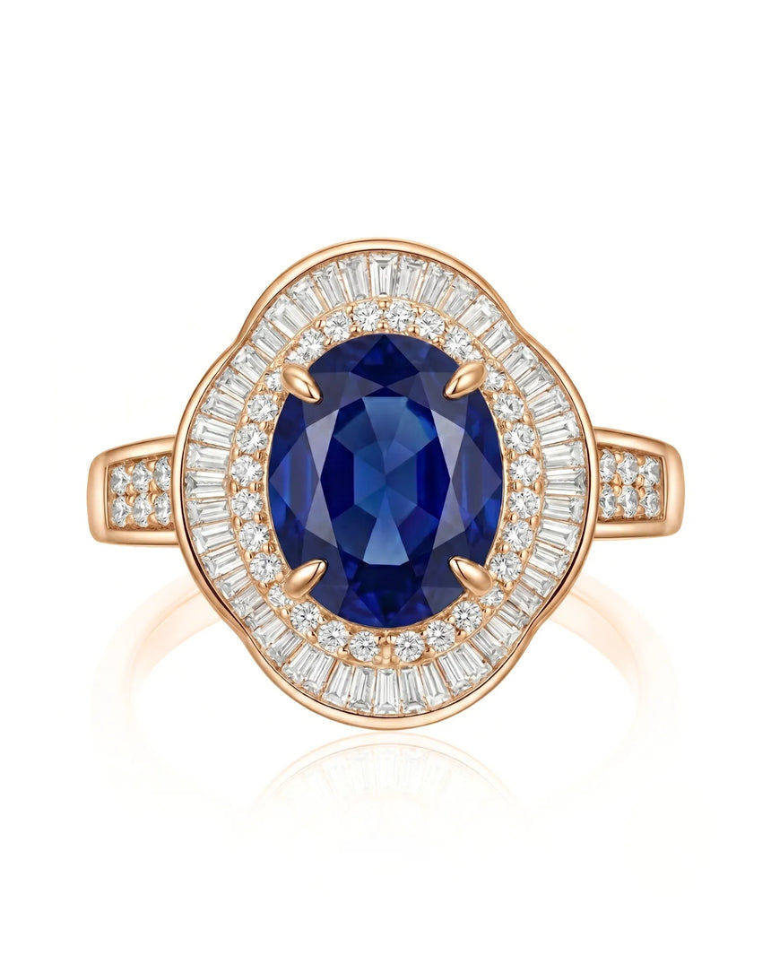 Unheated oval sapphire ring with tapered baguette diamonds and royal blue center in 18K rose gold | SARATTI