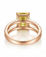 Unheated radiant yellow sapphire ring framed by luminous diamonds in 18K rose gold | SARATTI