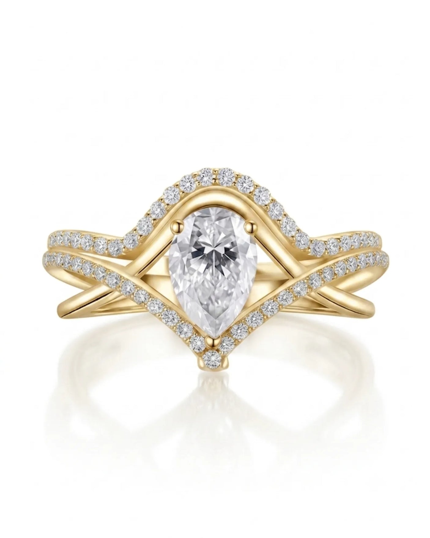 V-shaped pear moissanite engagement ring with open split shank and curved yellow gold wedding band | SARATTI