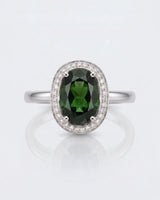 Verdantia diamond halo tourmaline ring with oval green gemstone in polished platinum | SARATTI